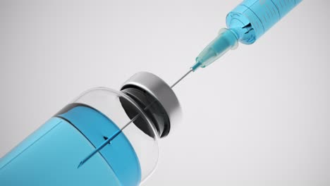 Long-syringe-needle-drawing-blue-liquid-from-a-glass-container.-The-liquid-level-dropping.-Sterile,-bright,-laboratory-background.-Clean,-modern,-patient-illness-treatment.--Closeup-shot.