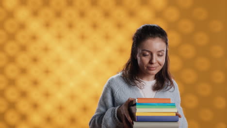 Portrait-of-friendly-woman-offering-stack-of-textbooks-useful-for-school