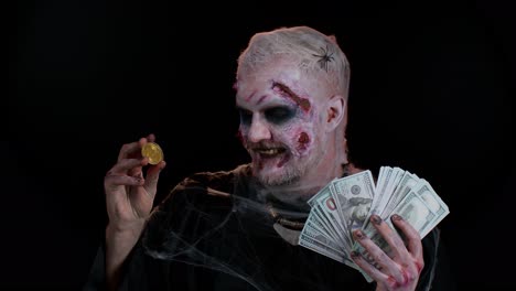 Creepy-man-with-bloody-scars-face,-Halloween-zombie-showing-golden-bitcoins-mining-future-technology