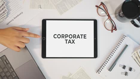 CORPORATE-TAX-DISPLAYING-ON-A-TABLET-SCREEN