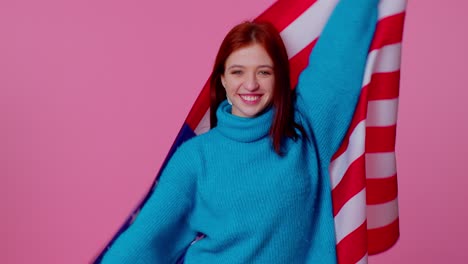 Cheerful-teen-girl-waving-and-wrapping-in-American-USA-flag,-celebrating,-human-rights-and-freedoms