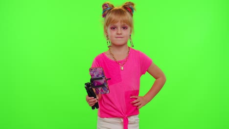 Stylish-kid-girl-making-trendy-dance-video-for-social-media-network,-child-dancing,-funny-blogger