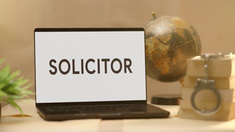 SOLICITOR-DISPLAYED-IN-LEGAL-LAPTOP-SCREEN