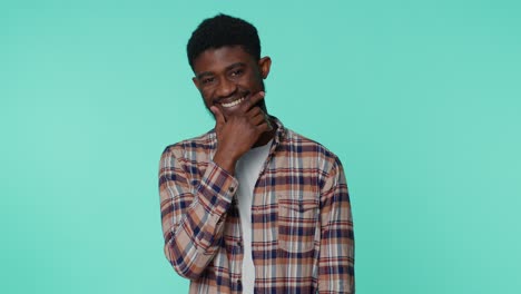 Cheerful-bearded-african-american-man-fashion-model-in-casual-shirt-smiling-and-looking-at-camera