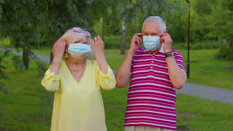 Quarantine-Coronavirus-is-over-ended-concept,-senior-old-family-grandparents-take-off-medical-masks