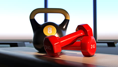 A-Pair-Of-Dumbbels,-Kettlebell,-Mat-And-Step-On-Hardwood-Floor.-Fitness-club-or-gym-equipement.-Pastel-gym-weights-and-green-yoga-mat-for-excercises,-crossfit,-yoga,-circuit-training.