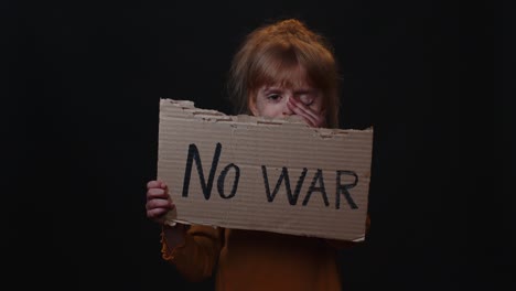 Afraid-dirty-faced-homeless-poor-girl-showing-banner-with-inscription-cardboard-massage-No-War