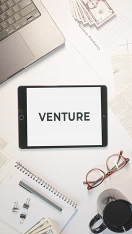 VERTICAL-VIDEO-OF-VENTURE-DISPLAYING-ON-A-TABLET-SCREEN