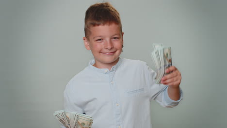 Toddler-boy-holding-cash-money-dollar-celebrate-dance,-success-business-career,-lottery-game-winner
