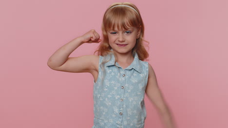 Fit-sporty-confident-little-preteen-child-girl-kid-showing-biceps-feeling-power-strength-success-win