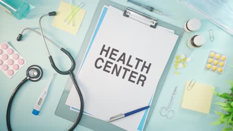 HEALTH-CENTER-WRITTEN-ON-MEDICAL-PAPER