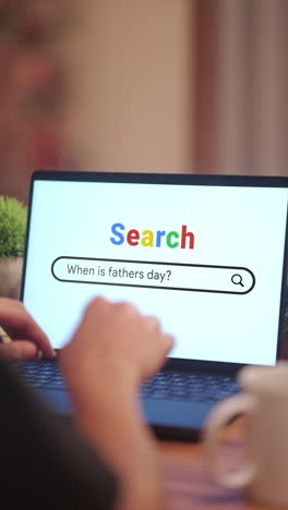 VERTICAL-VIDEO-OF-MAN-SEARCHING-WHEN-IS-FATHERS-DAY?-ON-INTERNET