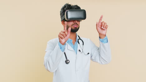 Excited-doctor-in-VR-goggles-man-using-headset-helmet-app,-watching-virtual-reality-3D-360-video