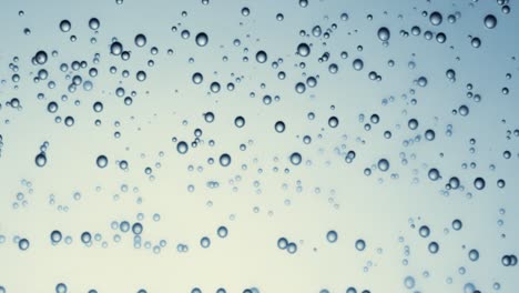 Muchas-Burbujas-De-Agua-En-Agua-Azul-Se-Acercan,-Onda-De-Agua-Abstracta-Con-Burbujas-En-Cámara-Lenta.