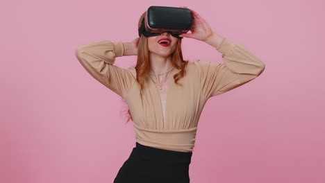 Girl-using-virtual-reality-futuristic-technology-VR-headset-helmet-to-play-simulation-3D-video-game