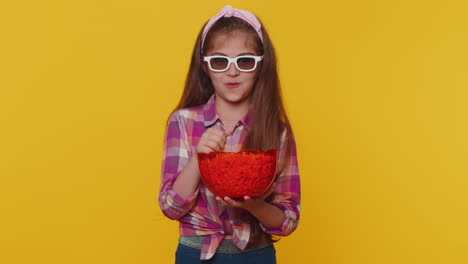 Little-toddler-children-girl-eating-popcorn,-watching-comedy-movie-film-cinema-wearing-3D-glasses