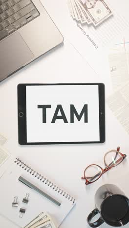 VERTICAL-VIDEO-OF-TAM-DISPLAYING-ON-A-TABLET-SCREEN