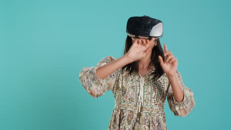 Woman-wearing-virtual-reality-headset,-doing-swiping-gestures