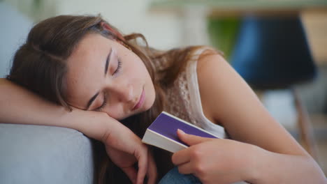 Woman-Sleeping-While-Reading-Boring-Book