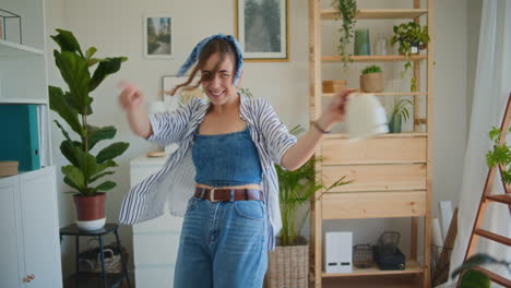 Happy-Woman-Dancing-with-Watering-Can