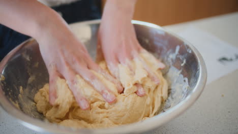 Kneeding-Dough-Baking-Cake-Close-Up