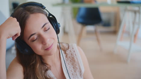 Relaxed-Woman-Chilling-Out-with-Music-in-Headphones