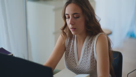 Pensive-Woman-Working-on-Laptop