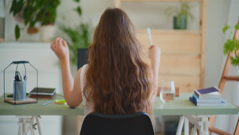 Back-View-Woman-Video-Conference