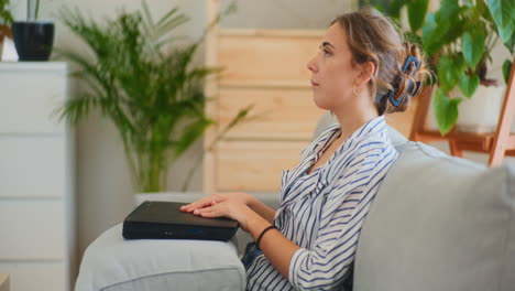 Overworked,-Depressed-Businesswoman-with-Laptop