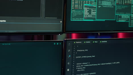 Hacking-malware-programming-script-on-monitors-in-underground-base