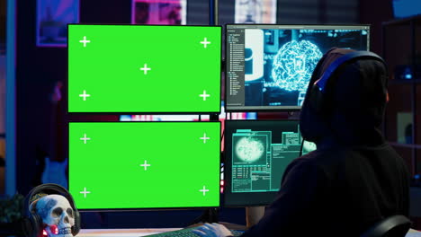 Rogue-developer-working-on-green-screen-computer-using-artificial-intelligence