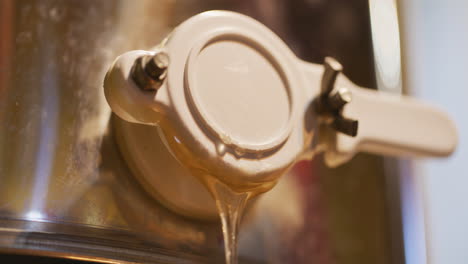 Close-Up-of-Fresh-Honey-Flowing-in-Apiary