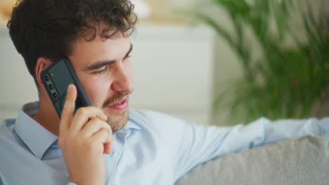 Close-Shot-of-Man-Talking-to-Customer-on-Phone