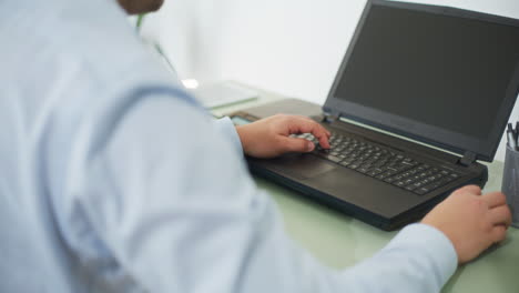 Close-Up-of-Typing-on-Laptop-Keyboard