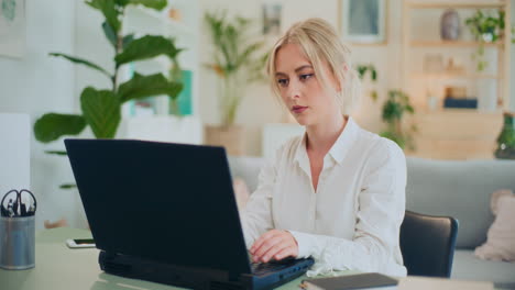 Businesswoman-Working-on-Laptop