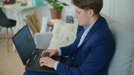 Businessman-Typing-on-Laptop