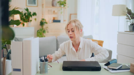 Businesswoman-Leaves-Computer-to-Sofa