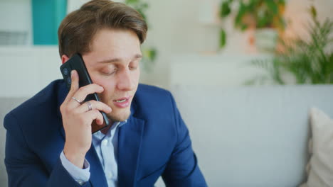 Happy-Businessman-Talking-on-Phone