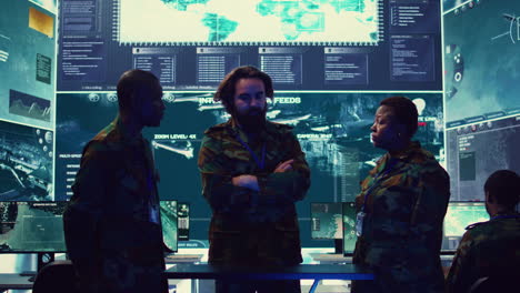 Brigadier-general-and-his-staff-studying-radar-data-on-a-holographic-image