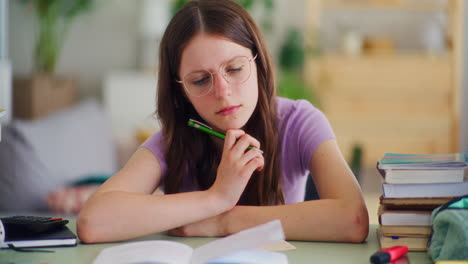 Young-Student-Reflects-While-Studying-and-Is-Thoughtful