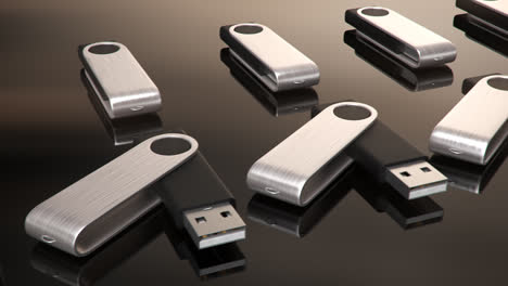 Computer-electronic-hardware-technology.-Close-up-on-the-USB-sticks-on-the-dark-background.-They-are-removable-flash-drives-used-to-store-digital-data.-Pen-can-fast-transfer-files-to-the-computer.