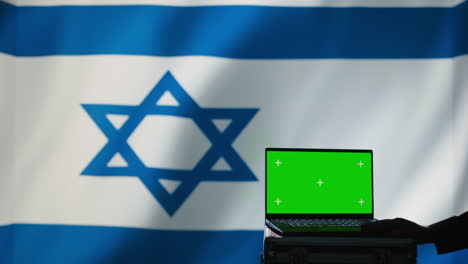 Israel-army-soldier-scanning-rockets-and-deploying-shields-with-mockup-laptop