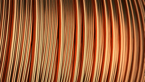 Close-up-of-pure-bright-copper-wire-on-the-spool.-Metallic-wires-are-used-in-the-electricity-and-electronics-industry-and-in-the-wire-manufacturing-process.-CG-loopable-animation.