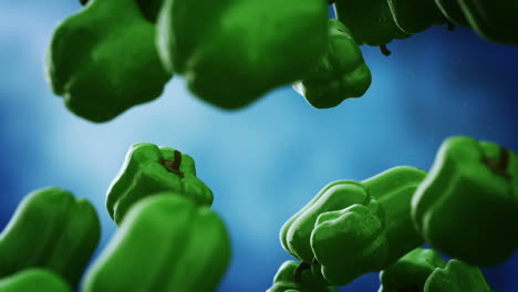 Clean-green-bell-peppers-with-water-droplets-falling-down-in-front-of-the-blurry-background.-Slow-motion-computer-generated-imagery-presenting-realistic-looking-vegetables-in-the-air.-Loopable.-HD