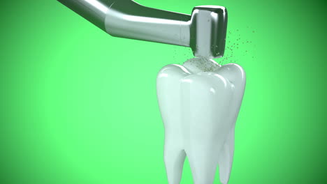Human-tooth-drilled-by-a-dental-borer-to-make-it-healthy-and-free-of-toothache.-Conceptual-video-explaining-the-dental-drilling.-The-visit-to-stomatology-clinic.-Green-background.-Zoom-in-view.-HD
