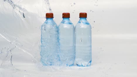 Fresh-Drinking-water-bottles-in-splash-blue-water.-Shot-on-super-slow-motion-camera-1000-fps.
