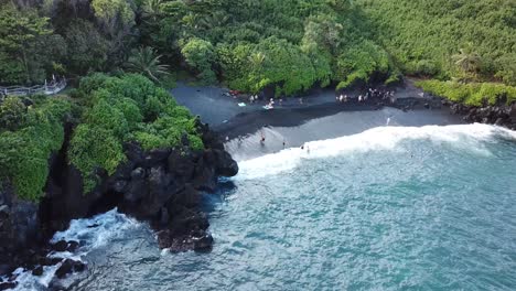 Aerial-view-of-the-black-sand-beach-of-Hawaii