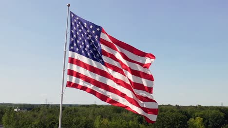 Circling-American-Flag-Waving-in-the-Wind,-Close-Up