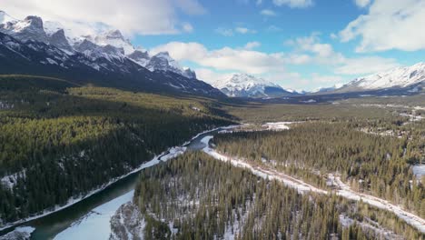 Aerial-view-of-Bow-river-and-mountains,-Canmore,-Alberta,-Canada