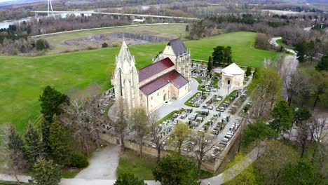 Panorama-Of-Historical-Romanesque-Church-And-Cemetery-In-Bad-Deutsch-Altenburg,-Austria